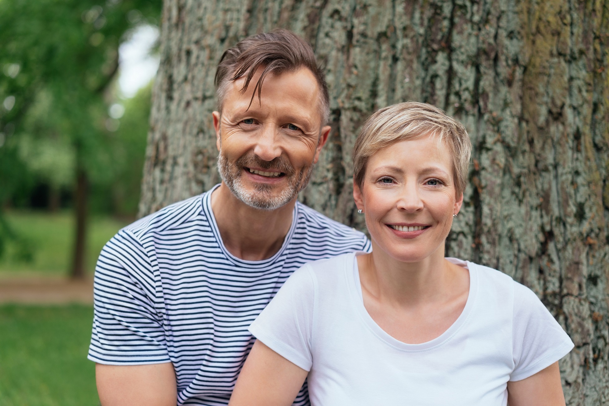 Couple by tree. Not real picture in story for privacy